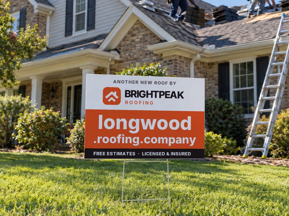 longwood.roofing.company on a yard sign in front of a house getting a new roof